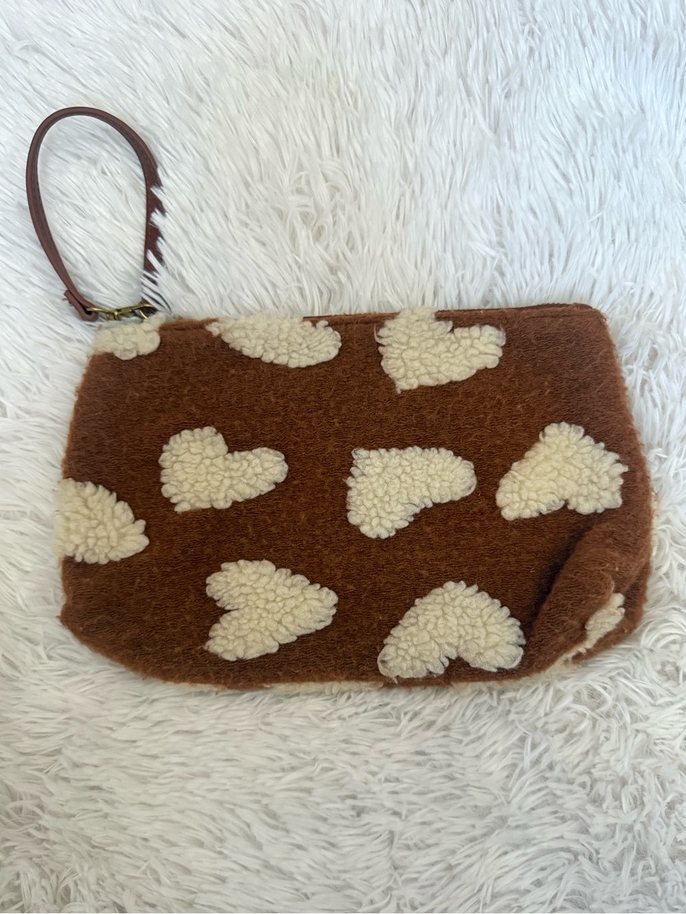 Anthropologie hearts faux wristlet